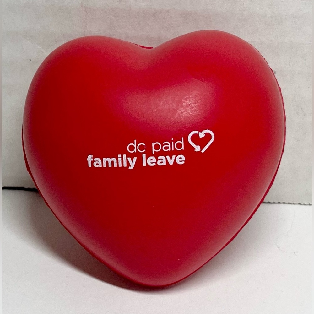 BRAND NEW SMALL RED HEART STRESS BALL (2 1/2 INCHES) "DC FAMILY PAID LEAVE"